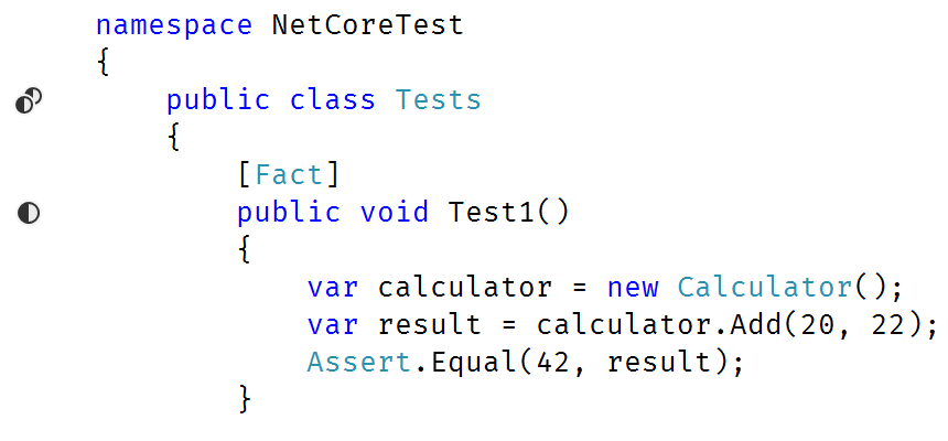 Editor showing gutter icon markers for test class and method