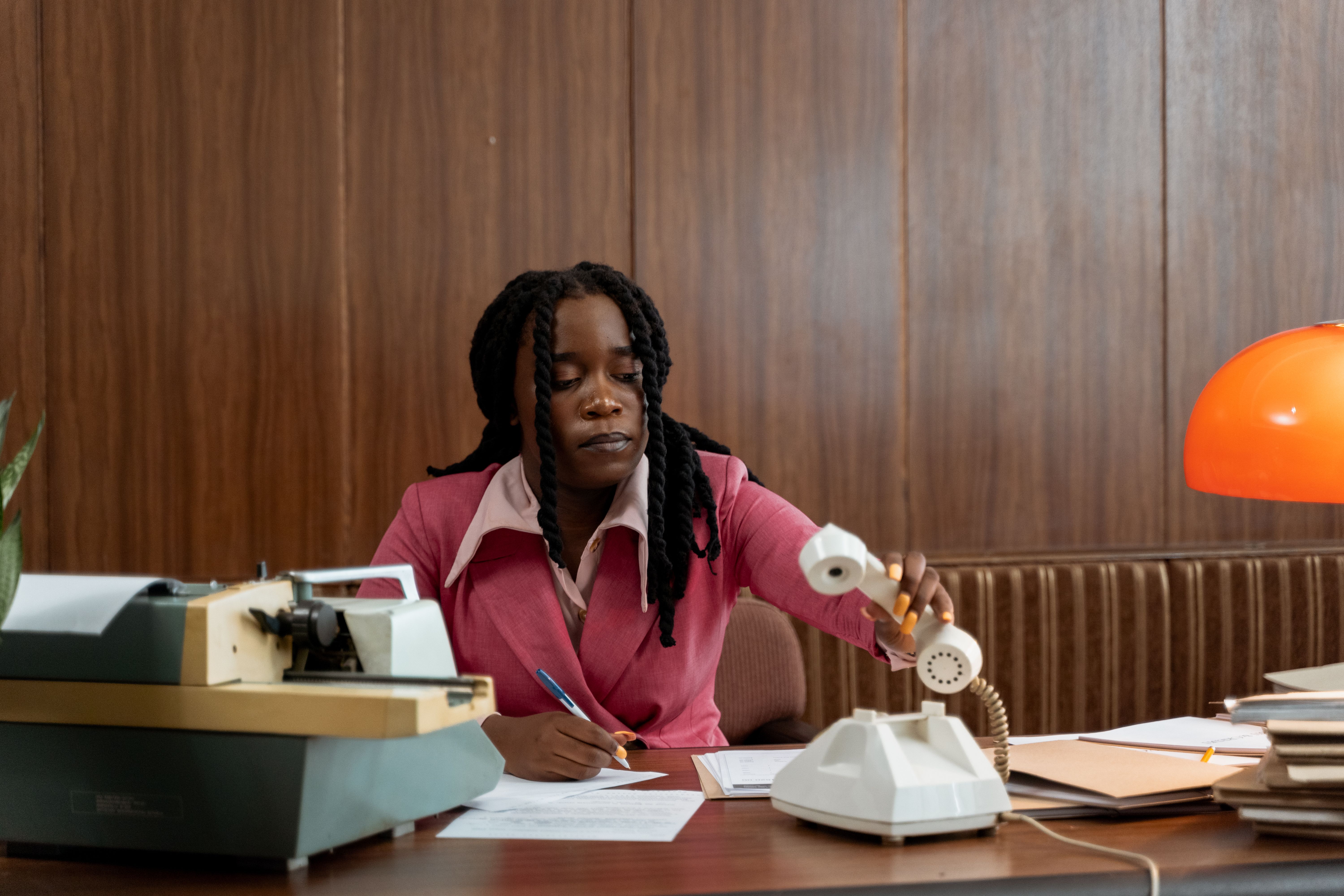 Public sector software projects, women on phone with paperwork